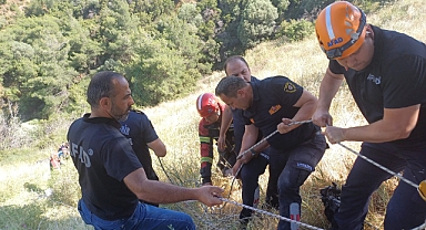 EKİPLER UÇURUMA YUVARLANAN ŞAHSI KURTARMAK İÇİN ZAMANA KARŞI YARIŞTI