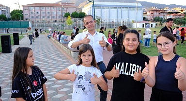 BAŞKAN DOĞANCA'DAN ÇOCUKLARA KARNE HEDİYESİ